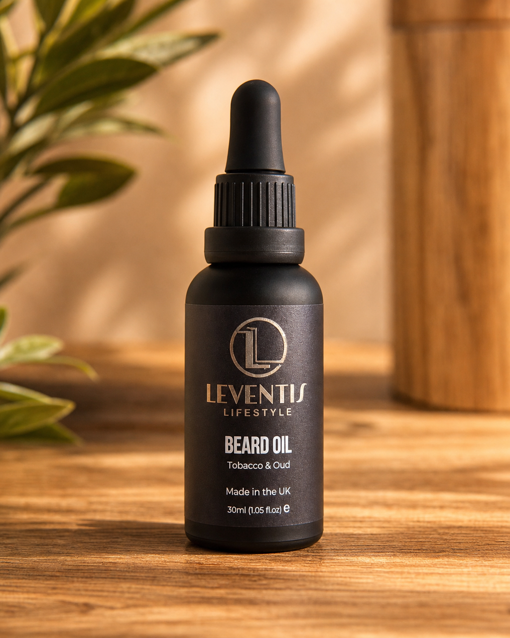 Leventis Lifestyle beard oil bottle on a wooden surface with a blurred background